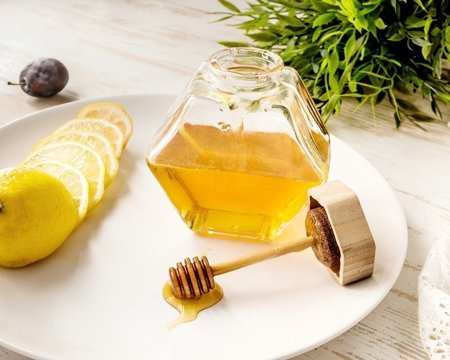 Hexagon honey jar with wooden dipper