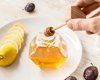 Hexagon honey jar with wooden dipper