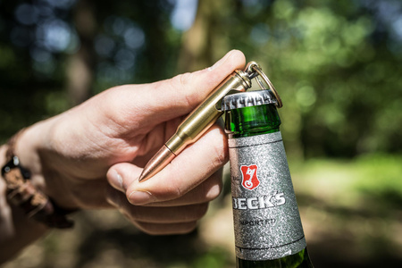 Bullet bottle opener