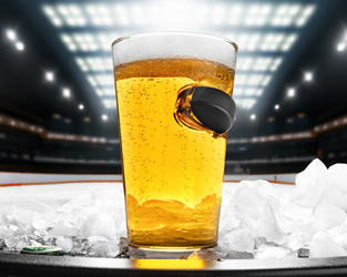 STUCK  in GLASS - HOCKEY PUCK  glass