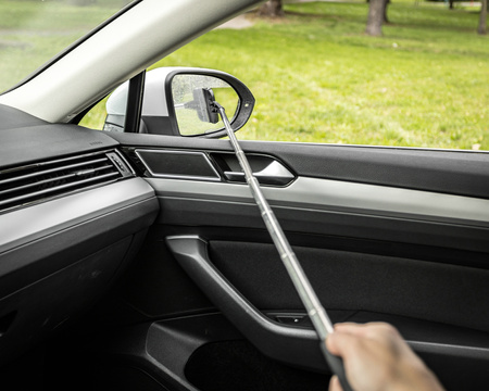 Telescopic side mirror wiper