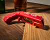 Cap gun bottle Opener